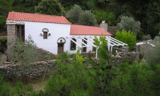 Armenistis Cottage | Old farmhouse, spacious open kitchen, a room with two single beds and a bedroom with a double bed in the shed next to the house; bathroom with toilet and shower