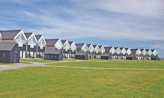Assens House | On the naturally beautiful western Fyn, these lovely two-storey cottages are located directly facing