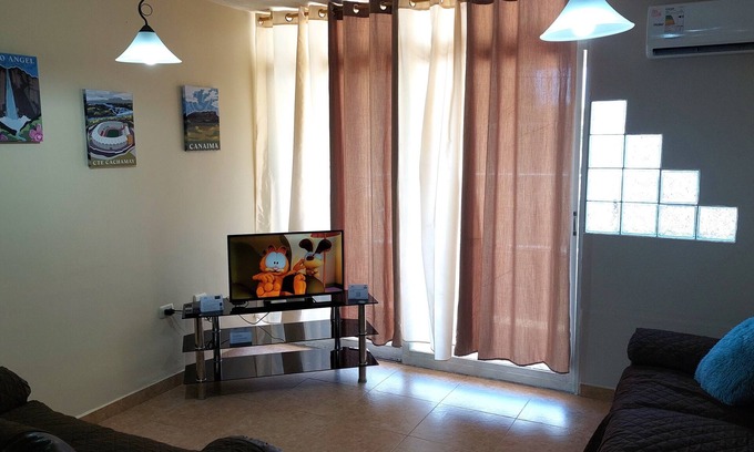 Camaran Apartment | One bedroom apartment in Guayana City with WiFi, A/A, kitchen and living room.