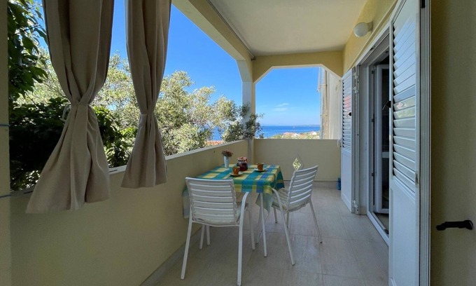 Lun Apartment | One bedroom apartment with terrace and sea view Lun, Pag (A-19358-a)