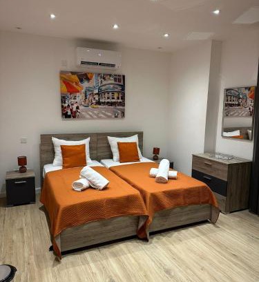 Ta' Pennellu House | One Bedroom in New Apt Mellieha- Orange Room 1
