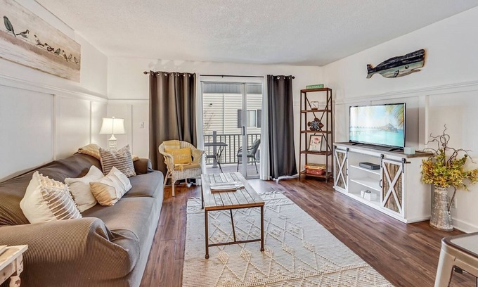 Demere Park Condo | One-bedroom sleeps 4 with sleeper sofa, complex has 2 pools, tennis courts,.