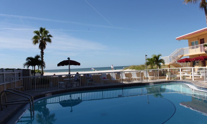 Madeira Beach Condo | OPEN nts SALE : 1bd 1ba Gulf front : Kitchen, Pool, and John's Pass access!