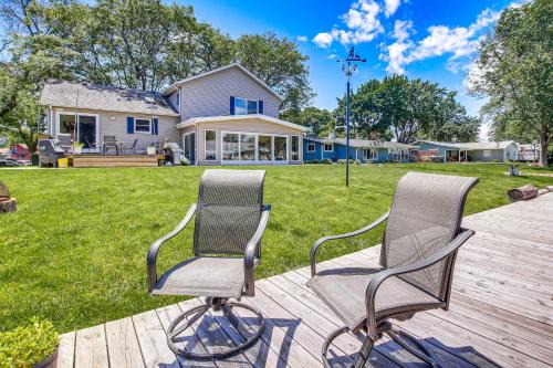Oshkosh House | Oshkosh Canal-Front Home with Sunroom and Watercraft!
