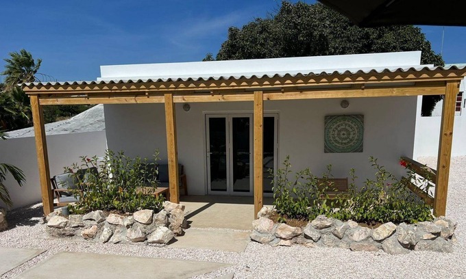 Jan Thiel Apartment | Our new two-bedroom apartment, located in a tropical garden, has a harmonious indoor-outdoor design, modern amenities, two comfortable bedrooms and a Plunge Pool in the shared garden, all for €95.00 per night