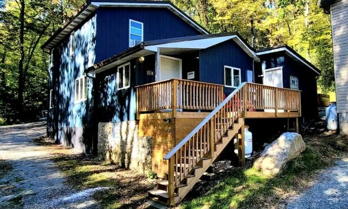 Jefferson Township Cabin | Outdoor hot tub & indoor soaking tub, bonfire pit, picnic area, foosball & more