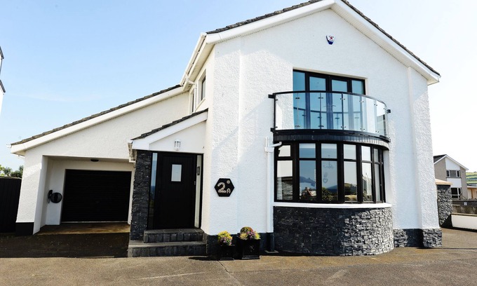 Bushmills House | Outstanding location, sea views, spacious detached house with private garden