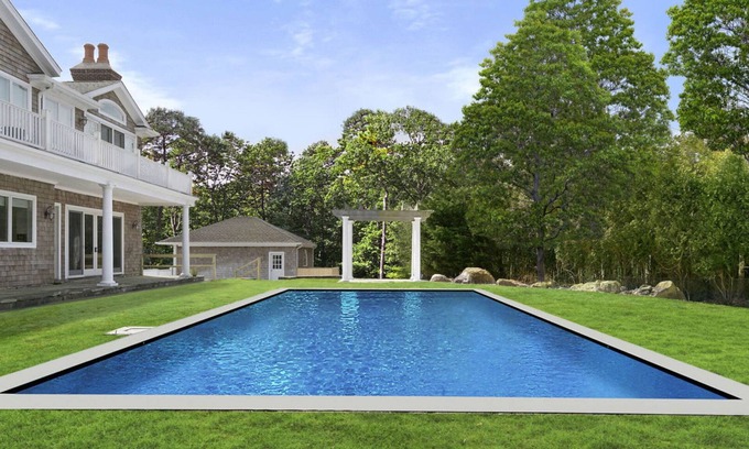 East Hampton House | OVERLOOKING THREE MILE HARBOR, DOUBLE-HEIGHT FOYER WITH CHANDELIER,.