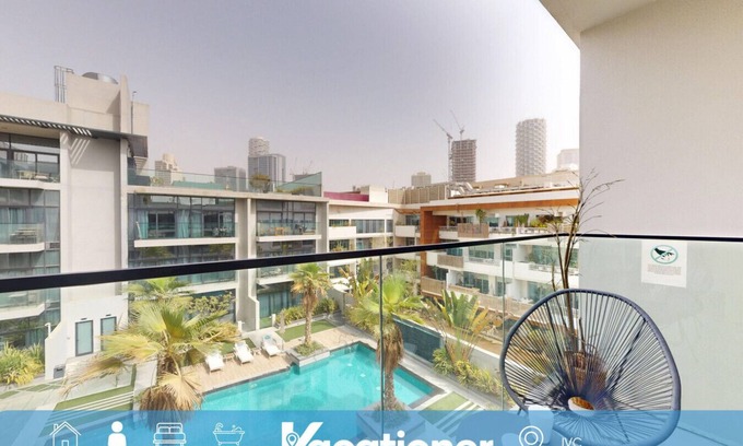 Jumeirah Village Apartment | Oxford Boulevard - BohoChic Studio with Pool View