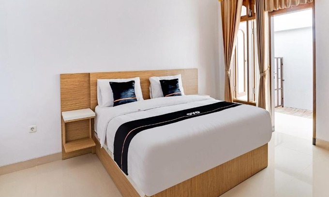 Sinduharjo Hotel | OYO 3384 Banua Raya