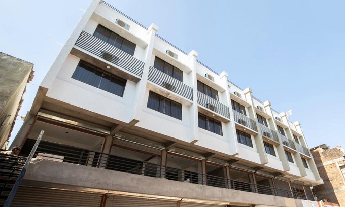 Ambaji Hotel | OYO Flagship Hotel Temple View