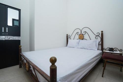 Surabaya Hotel | OYO Life 2498 Kost Putri Purimas 23