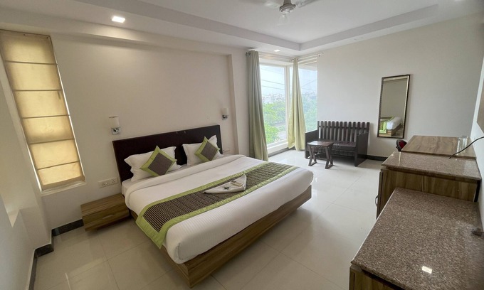 Jharsa Village Hotel | Pacific Inn Green