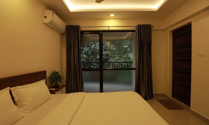 Nedumbassery Apartment | PAL SUITES ROOMS,n2min to the COCHIN INTERNATINAL AIRPORT NEDUMBASSERY