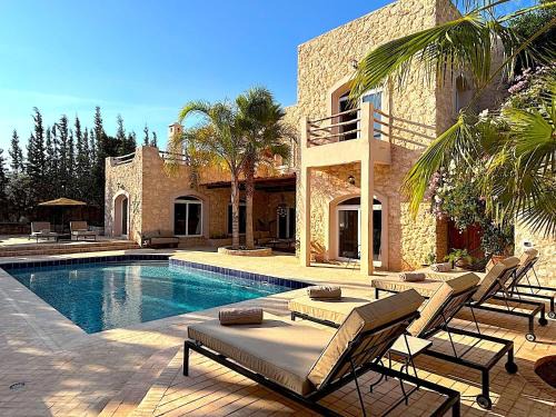 Ida Ougourd Villa | Palais Babel