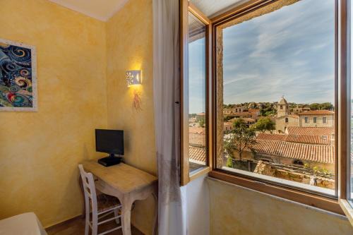 San Pantaleo Apartment | Palazzo Beddoro