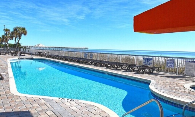 Downtown Myrtle Beach Condo | Panoramic Oceanfront Condo, Highly Sought After End Unit, Glass Wrapped Around