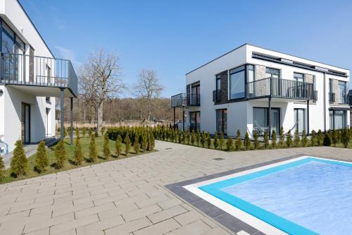 Lukecin Apartment | Paraiso Nadmorskie Apartamenty z Basenem i Parkingiem by Noclegi Renters