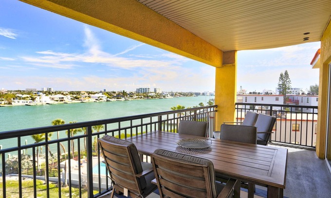 Treasure Island Condo | Partial Gulf View! Top Floor/Corner Unit. Watch dolphins from balcony. Great Views & Great Location!
