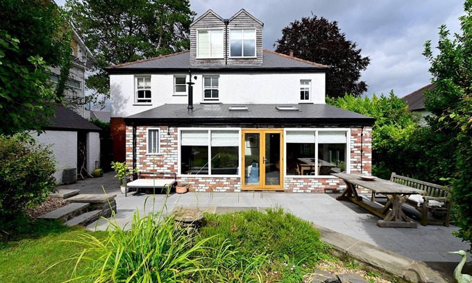 Radyr and Morganstown House | Pass the Keys | 4-Bedroom Retreat in Radyr w/Lush Gardens & Parking