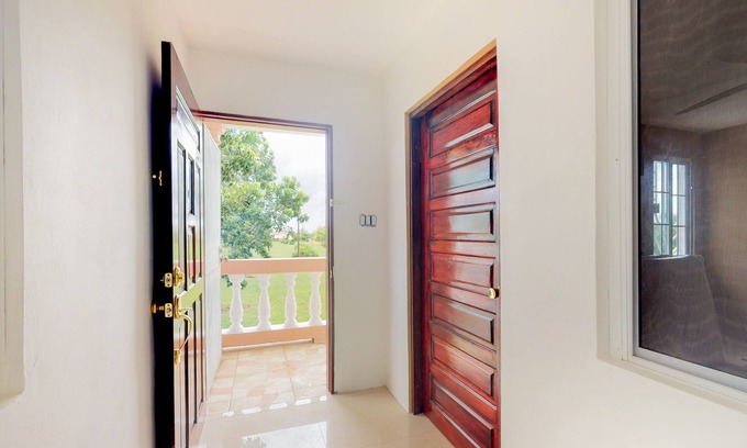 Dangriga Apartment | Peaceful Dangriga cabin, Belize seclusion, private retreat, nature scape.