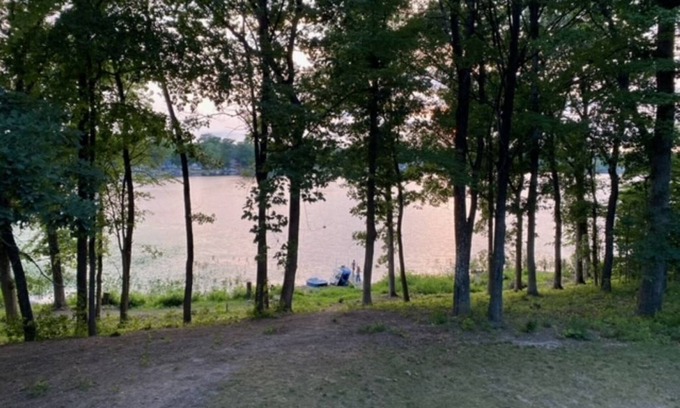 Delton House | Peaceful Lake House with pontoon boat rental on property.n