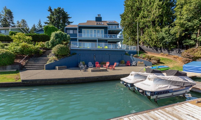 Bonney Lake House | Peaceful lakefront home with firepit, hot tub, pool table, dock, balcony, & deck