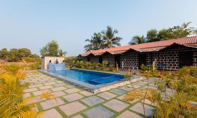 Nagoa House | Peacock Retreat 4BR Cottages with Private Pool & Scenic Views Saligao