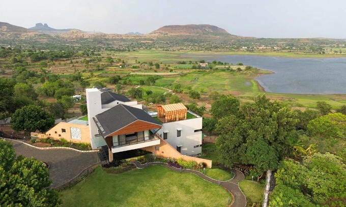 Igatpuri Villa | Pearl Lakeview Mansion by StayVista - Lakeside villa with Infinity pool, Jacuzzi, In-house theatre & Games room