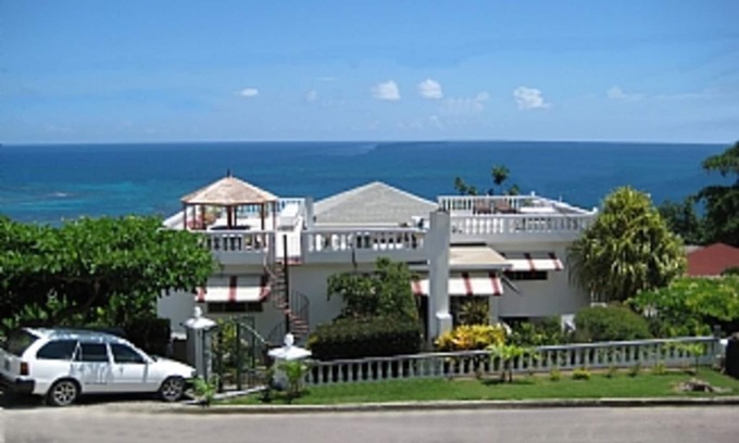 Hopewell Apartment | Penthouse Apartment With Magnificent Sea Views. Minutes from the beach.