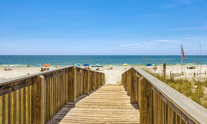 Orange Beach Condo | Penthouse-level condo with ocean views, beachfront access, pools, hot tub, & gym