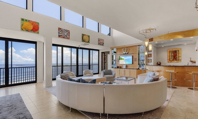 Punta Rassa House | Penthouse Oasis: 180° Water Views & Heated Pool