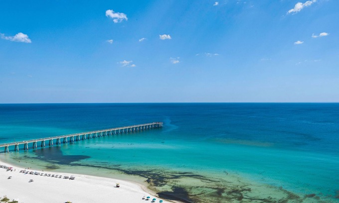 Navarre Beach Condo | PENTHOUSE - TOP FLOOR - BEACHFRONT & CHAIRS - POOL - BALCONY - GYM-NEW ELEVATORS