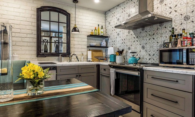 The Point Cottage | PERFECT LOCATION, 2 bedroom two bath furnished unit. Where history meets charm.