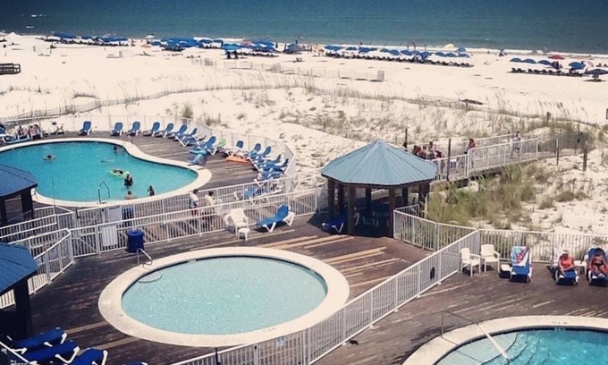 Orange Beach Condo | PERFECT LOCATION FOR UNCROWED BEACH LOVERS! HEATED POOL.LOFT BEDROOM W/KING BED.