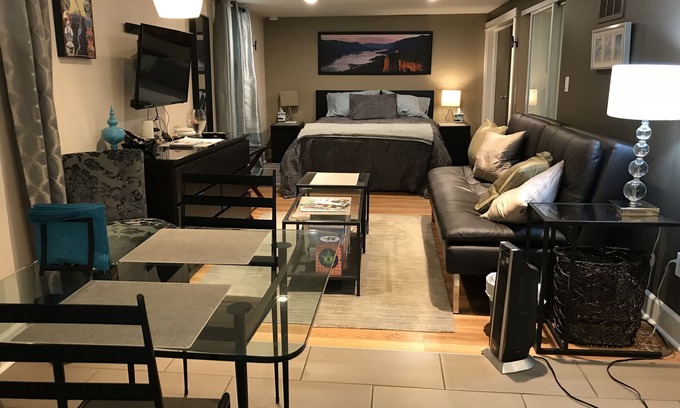 Belmont House | Pet friendly apartment with covered patio and fenced-in yard.