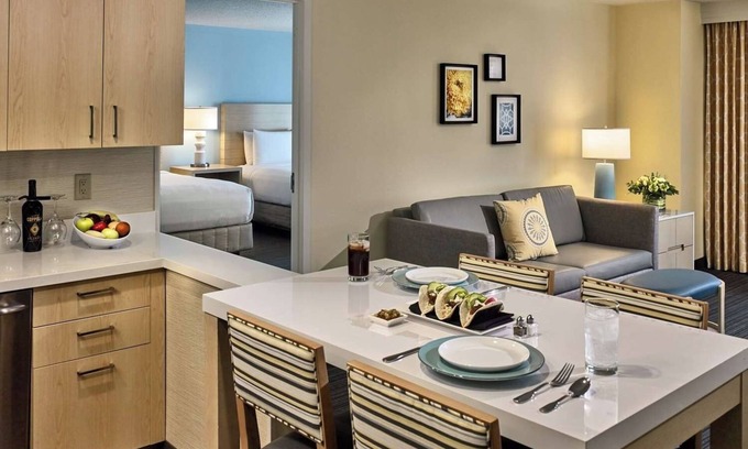 Central Business District Apartment | Pet-Friendly Haven! Unit with Kitchen, Onsite Parking, Free Breakfast!
