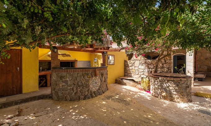 Carloforte House | Pet-Friendly Holiday Home Pescetti Bobba C with Mountain View & Garden