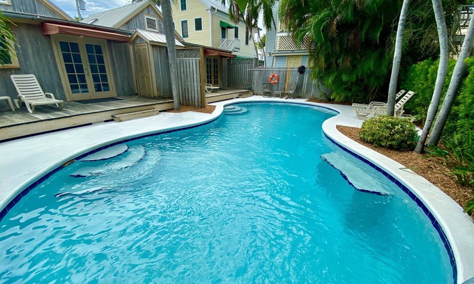 Uptown - Upper Duval Cottage | Pete's East Cottage: Cypress east cottage steps from Duval