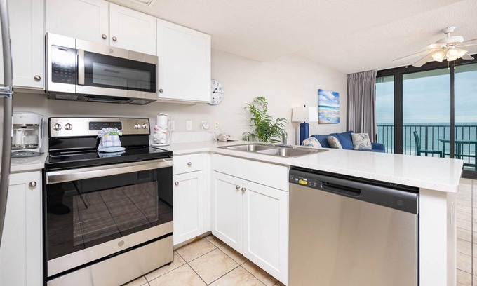 Gulf Shores Condo | Phoenix Hotels on the BEACH! FREE Wifi - Full Kitchen ~ Bunks!