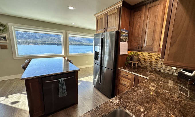 Ketchikan Apartment | Picture Perfect on the Water with large deck for spotting whales, eagles & more!