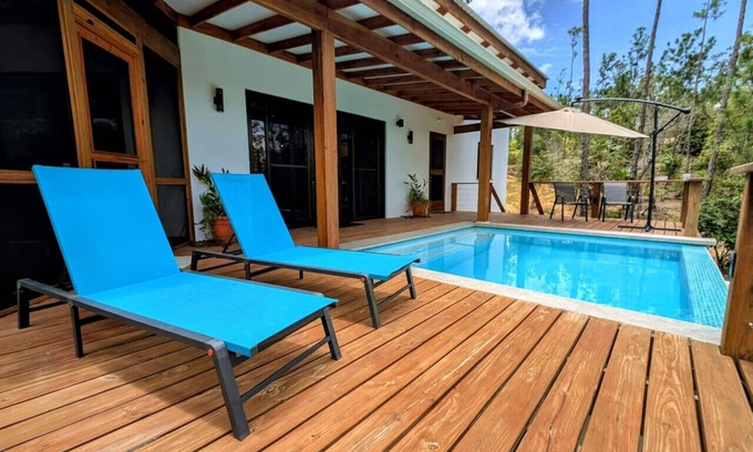 Blancaneau Villa | Pine ridge retreat villa w/pool & waterfall
