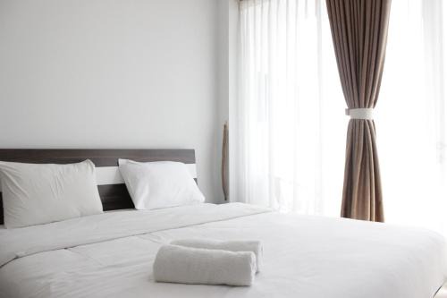 Hegarmanah Apartment | Pleasant 1BR Apartment with Sofa Bed at Dago Suites By Travelio