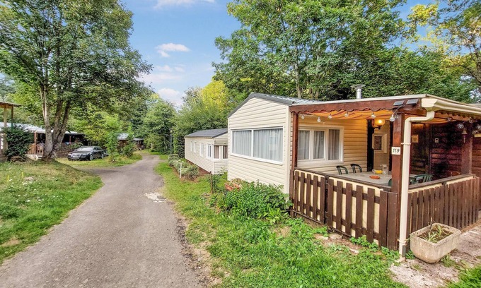Besse-en-Chandesse House | Pleasant and cozy mobile home on a family friendly campsite.
