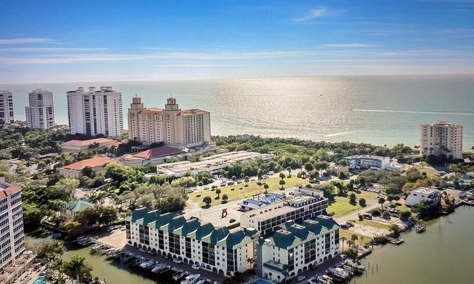 Vanderbilt Beach Condo | PLEASE READ DESCRIPTION! Vanderbilt Beach area with Bay views from Lanai.