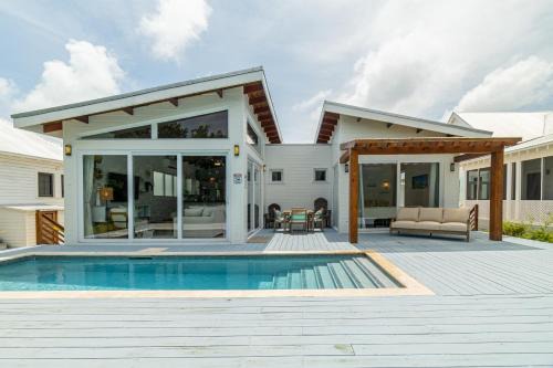 San Pedro Villa | Plumeria House at Mahogany Bay and Pool Club