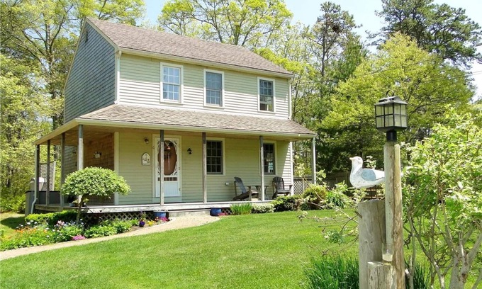 Dennis Cottage | Pond View~ Abuts conservation and walking trails. There is fishing at the pond