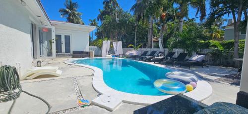 Hollywood Lakes Villa | Pool Paradise Half mile to Beach w Massive Yard!