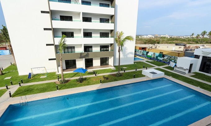 Villa Marina Apartment | Pool View Studio, Home Office Space, Amenities everywhere, Secure, Near beach