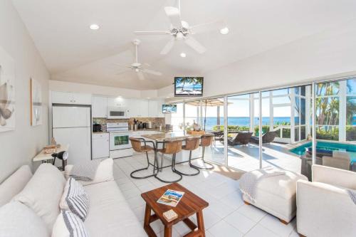 Rum Point Apartment | Pools of the Kai 6 - Beachfront Condo with Private Pool Atrium, Modern Kitchen, and Outdoor Grill